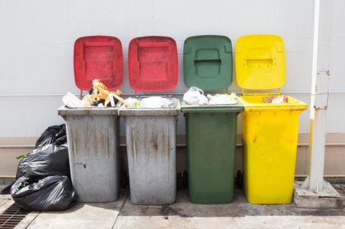 A team of professionals performing home clearance in a Central London flat