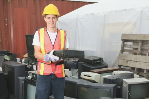 Team implementing waste management strategies on site